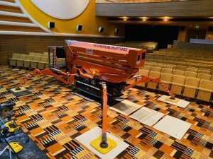 Tracked Spider Platform In Position Inside The Auditorium with point loading floor protection in place.